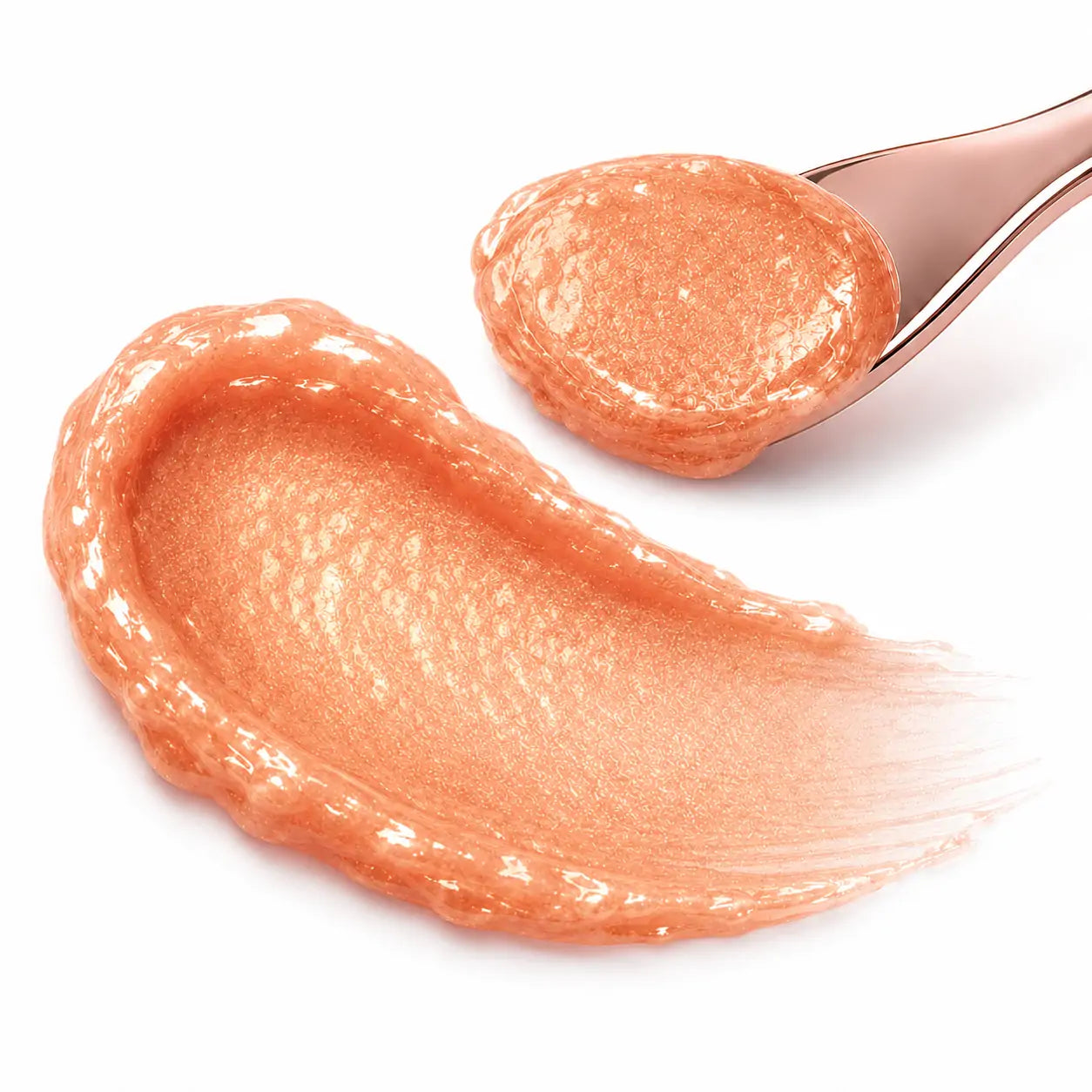 Close da textura cremosa do Iluminador Balm O Sfumato™ Ouro Pêssego com brilho intenso e acabamento glow.
