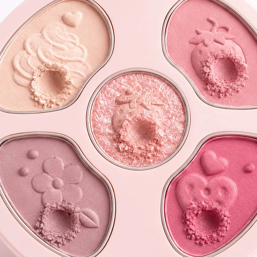 Paleta de sombras O Sfumato Morango com Creme com embalagem rosa redonda e tons suaves de rosa, creme e brilho