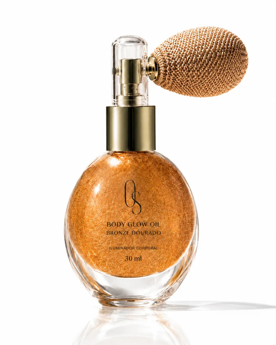O Sfumato Óleo Iluminador Corporal Bronze Dourado 30 ml em frasco com aplicador sobre fundo branco