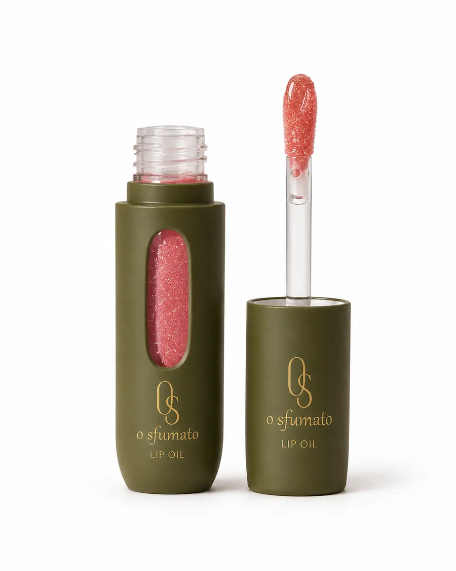 O Sfumato™ Lip Oil Rosa Goiaba Translúcido em embalagem verde com aplicador
