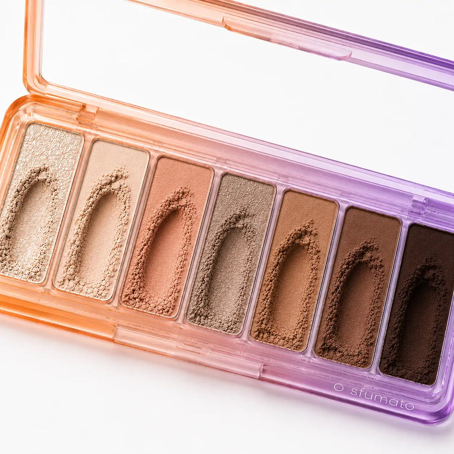 Paleta de sombras O Sfumato™ Nude Pêssego com embalagem em degradê laranja e lilás e tons neutros para maquiagem dos olhos