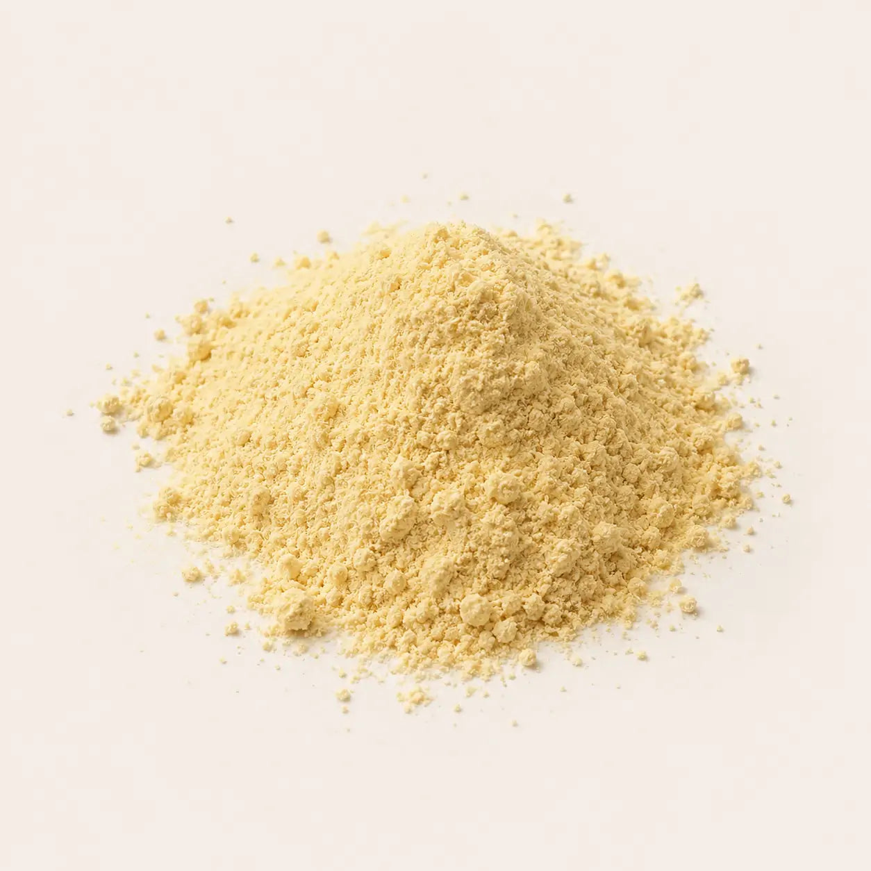 Textura do pó solto banana O Sfumato™ em tom amarelo claro sobre fundo neutro