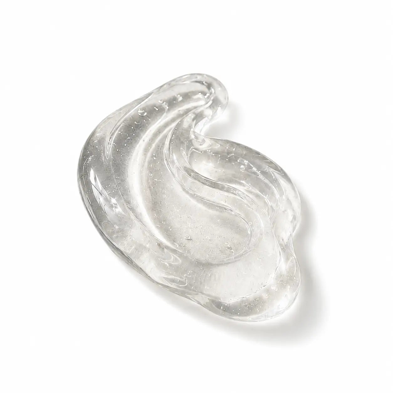 Textura transparente do Gel Reparador Pós-Sol O Sfumato™ com bolhas em fundo branco