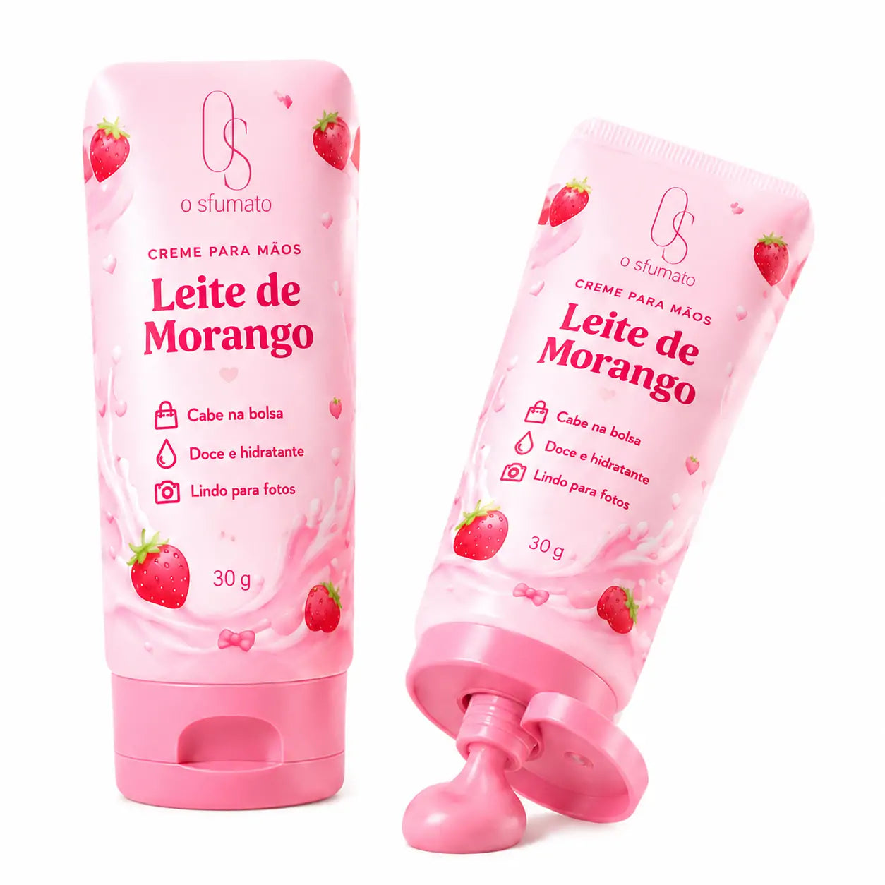 Creme para Mãos Leite de Morango O Sfumato™ em tubo rosa com tampa aberta e textura cremosa sobre fundo branco.