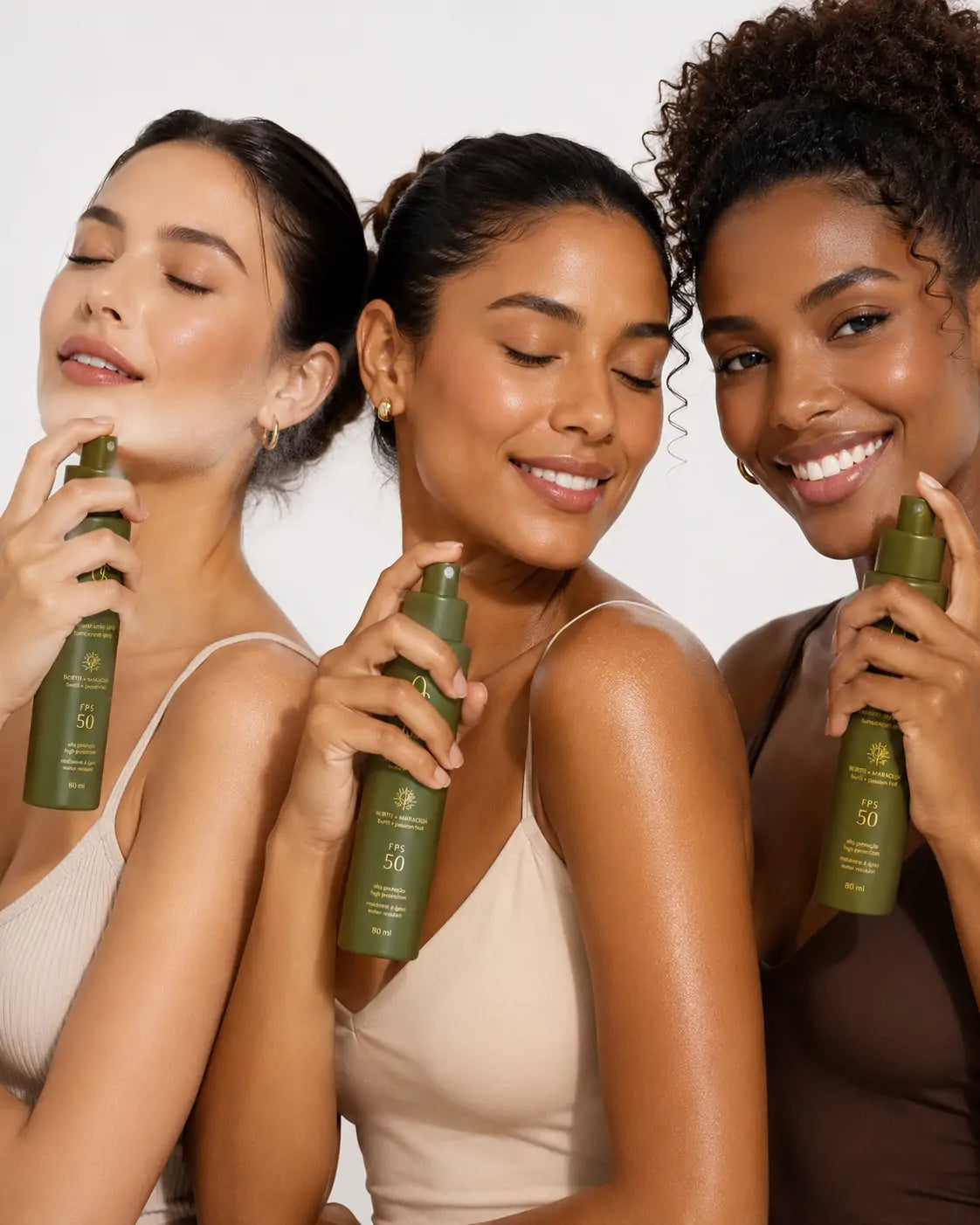 Três modelos brasileiras de diferentes tons de pele usando O Sfumato™ Protetor Solar Spray FPS 50
